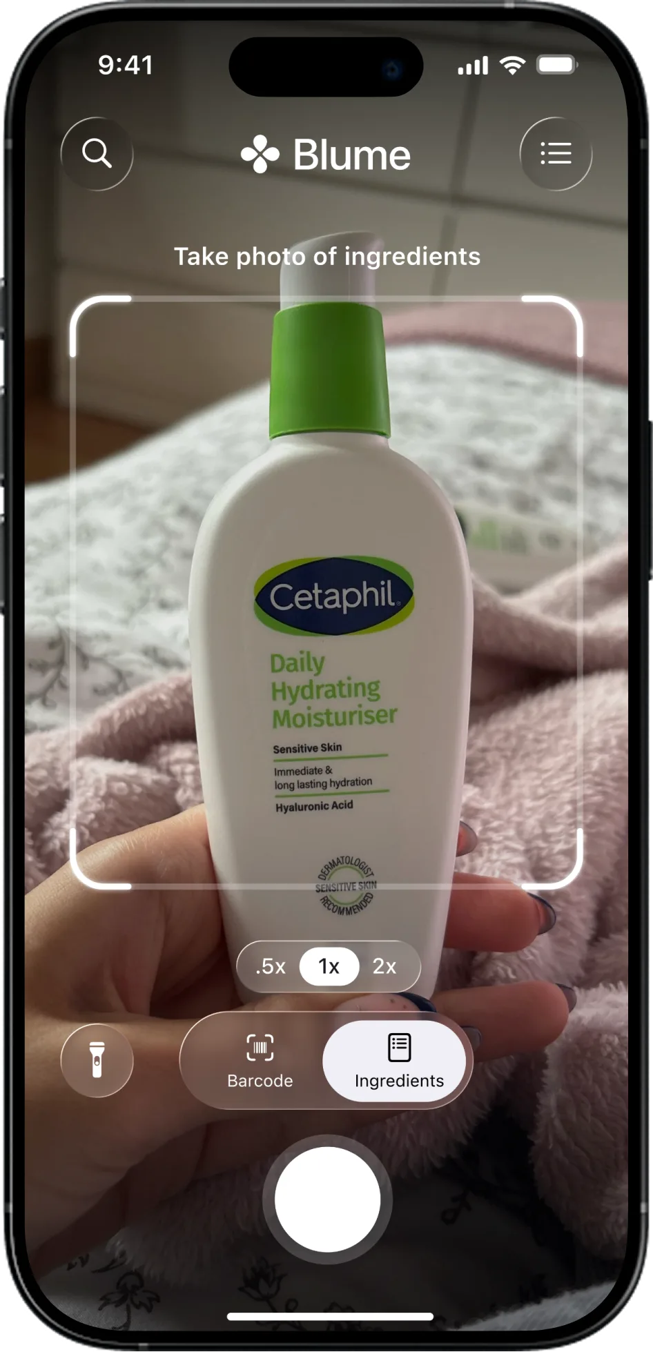 Blume scanning a Cetaphil bottle in the camera viewfinder